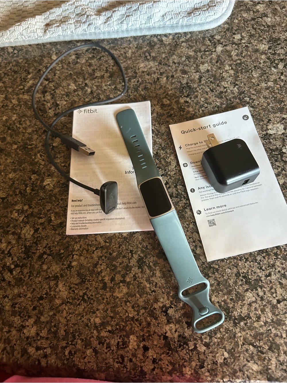 Fitbit Smartwatch with Teal Silicone Band and Charger